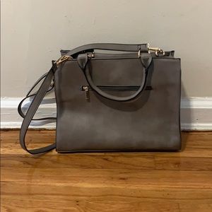 Grey zipper close tote. Removable strap.